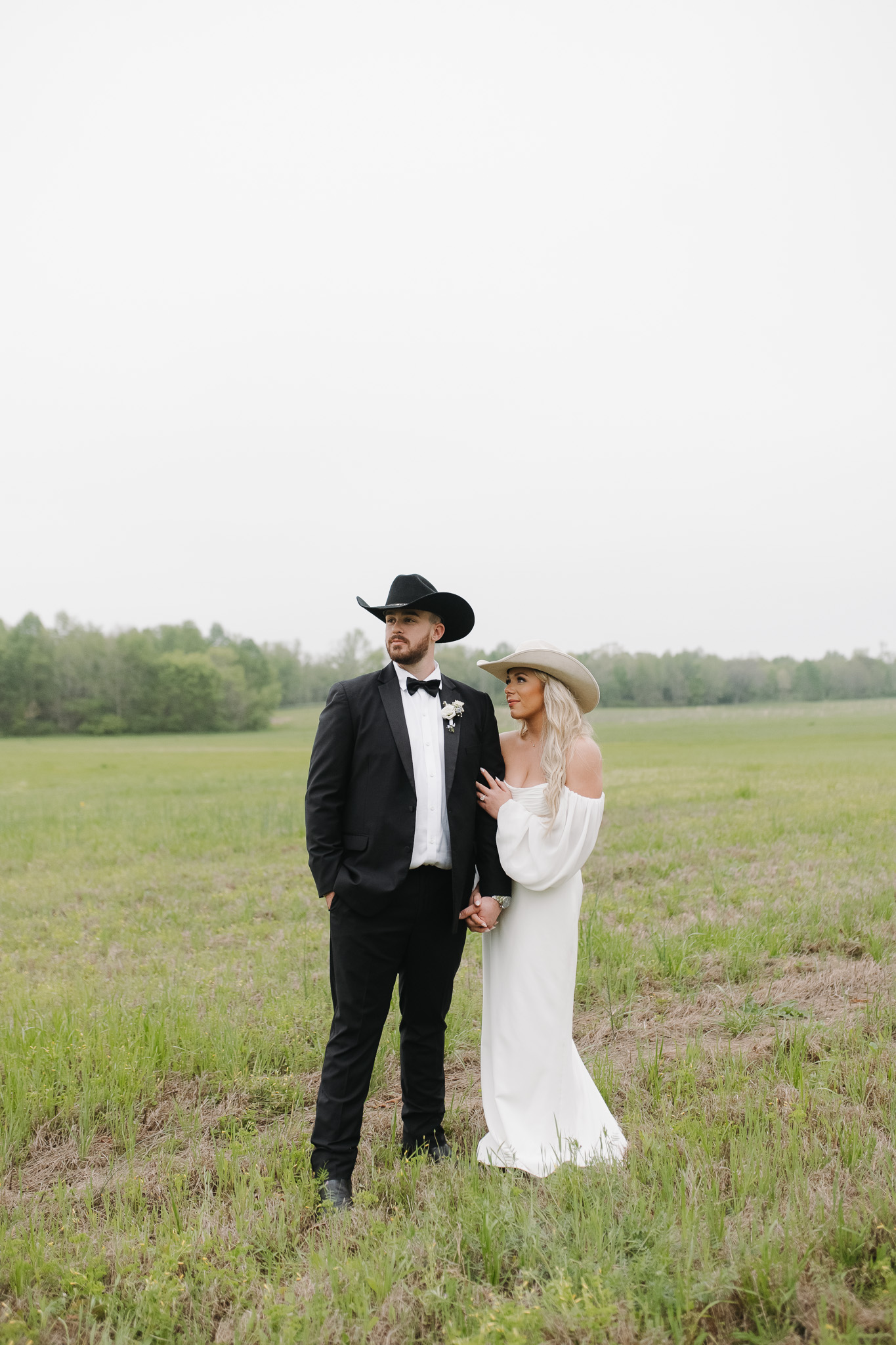 Nashville Tennessee wedding day, bride and groom portraits in the open grass field at the venue, The Monroe on 415th